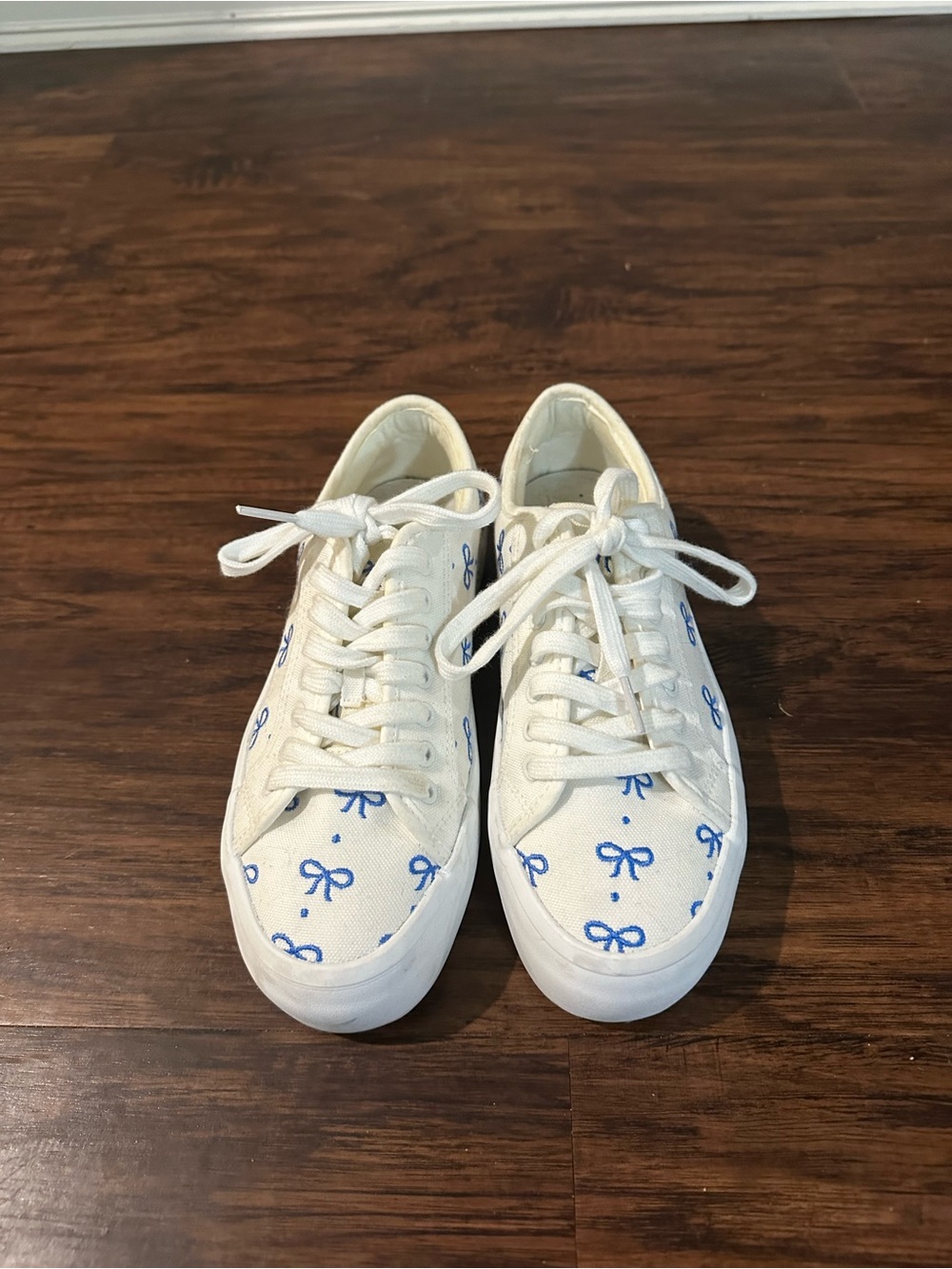 White Canvas Lace-Up Sneakers with Blue Bow Print